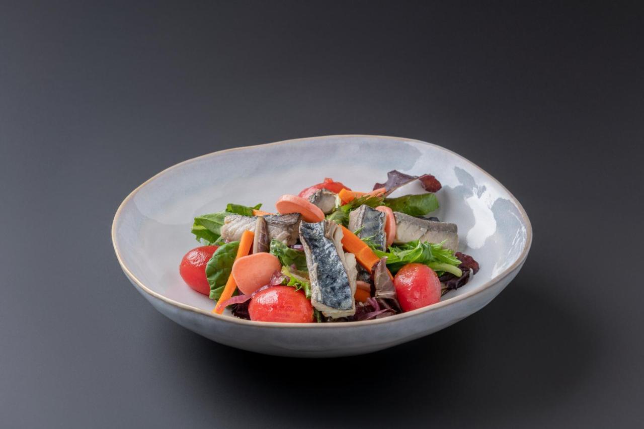 Eurostars Portico Alicante Zewnętrze zdjęcie A salad with sardines